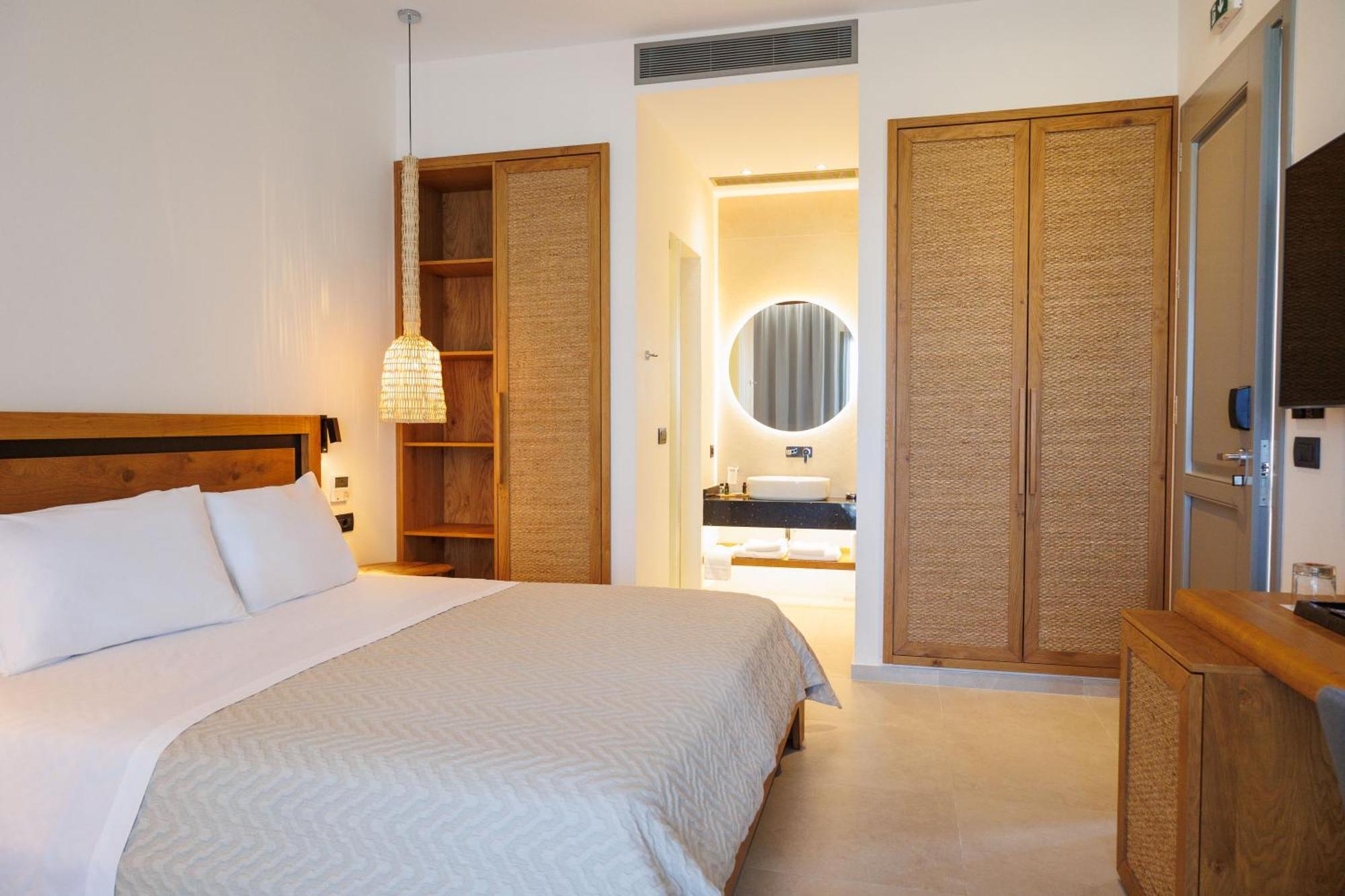 Kouros Blanc Resort & Suites Pounda Pokoj fotografie